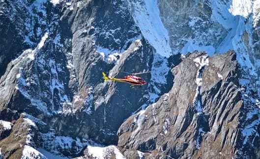 Photo 2: everest helicopter tour flying between mountains 1786272752247 0u4lue