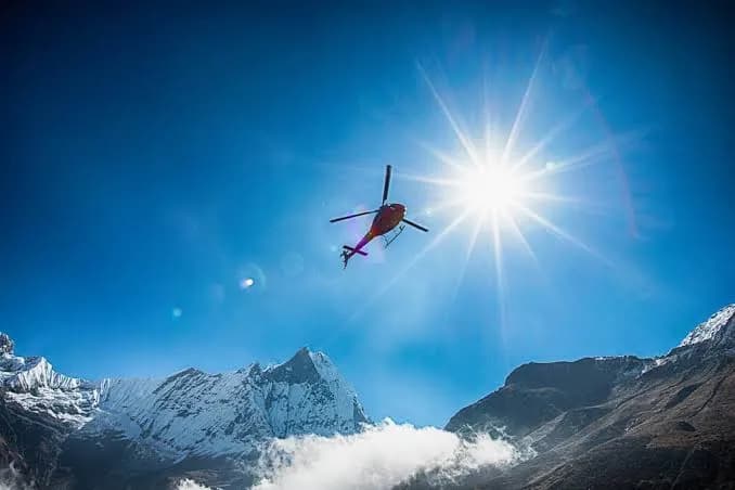 Photo 2: heli flying above annapurna base camp 1786276818715 np85dg